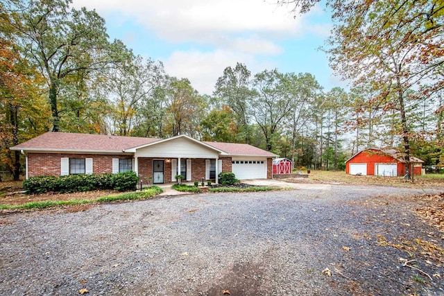 single story home featuring a garage