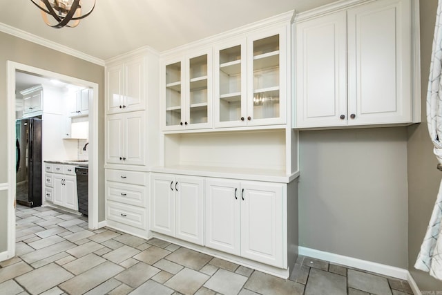 kitchen with black appliances, white cabinetry, and crown molding