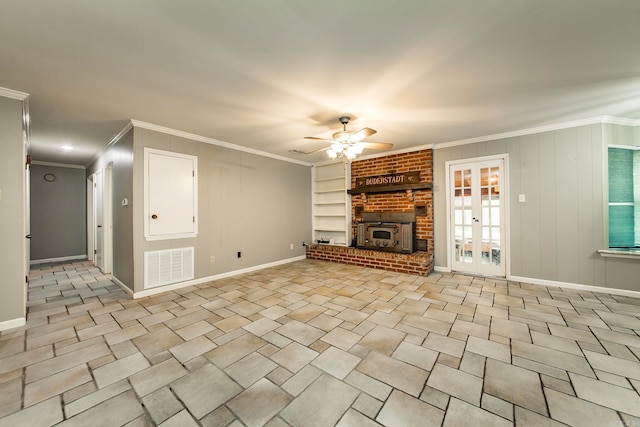 unfurnished living room featuring built in features, ornamental molding, and ceiling fan