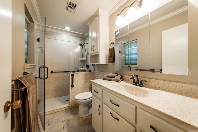 bathroom with a shower with door, vanity, tile patterned floors, and crown molding