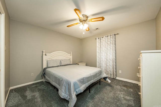 bedroom featuring dark colored carpet and ceiling fan