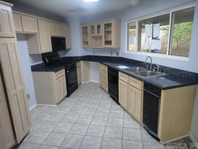 85 Bluff View Dr, Quitman, AR 72131 - kitchen featuring black appliances, a sink, glass insert cabinets, and light tile patterned floors