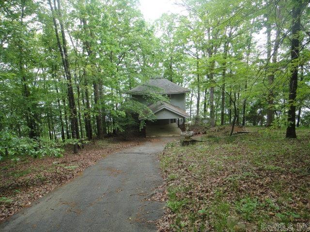 85 Bluff View Dr, Quitman, AR 72131 - view of front facade with driveway and a carport