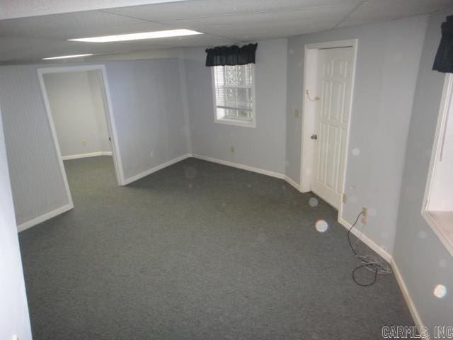85 Bluff View Dr, Quitman, AR 72131 - below grade area featuring dark colored carpet and baseboards