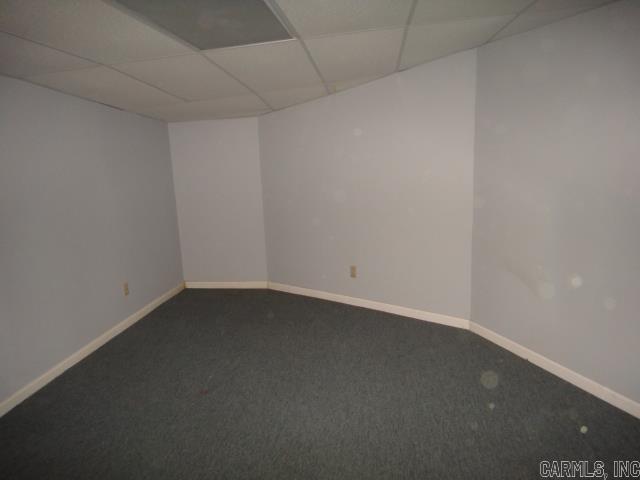 85 Bluff View Dr, Quitman, AR 72131 - carpeted spare room with a drop ceiling and baseboards