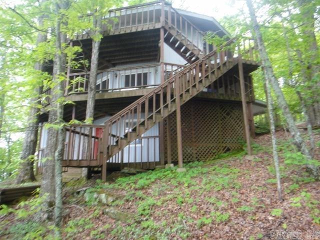 85 Bluff View Dr, Quitman, AR 72131 - rear view of house with stairway and a wooden deck