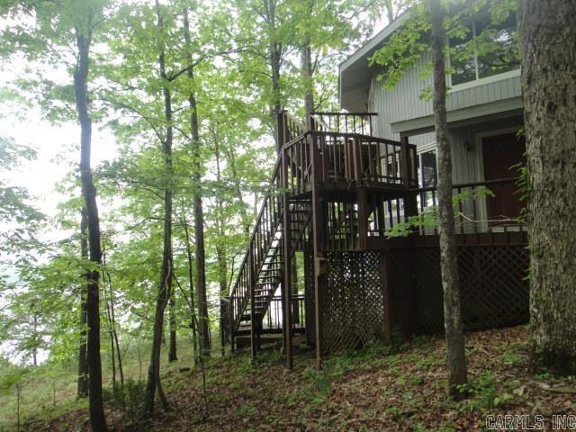 85 Bluff View Dr, Quitman, AR 72131 - view of playground with stairway and a deck