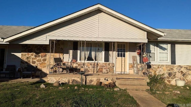 view of front of home featuring covered porch