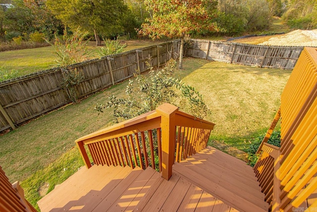 wooden terrace with a yard