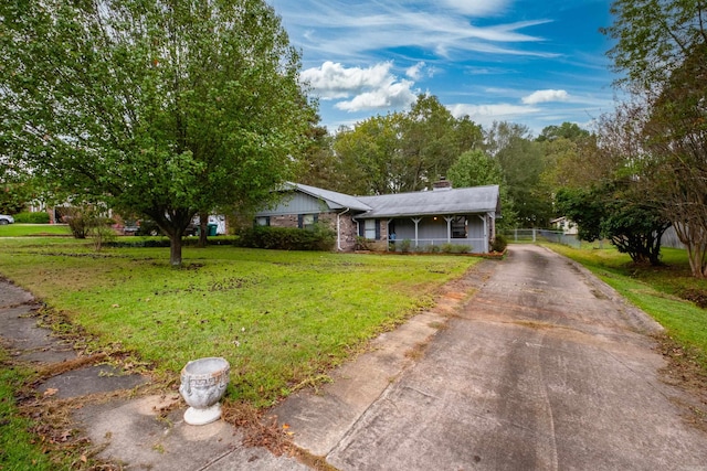 view of front of home with a front yard