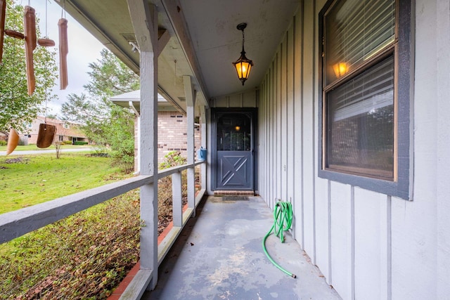 entrance to property with a yard