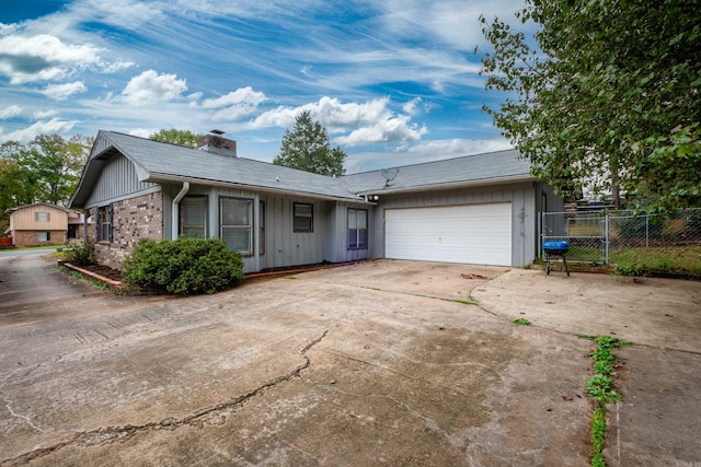 ranch-style home with a garage