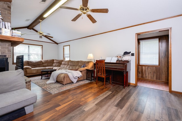 living room featuring lofted ceiling with beams, dark hardwood / wood-style flooring, and ceiling fan