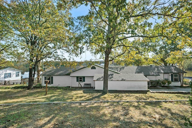 exterior space with a front lawn