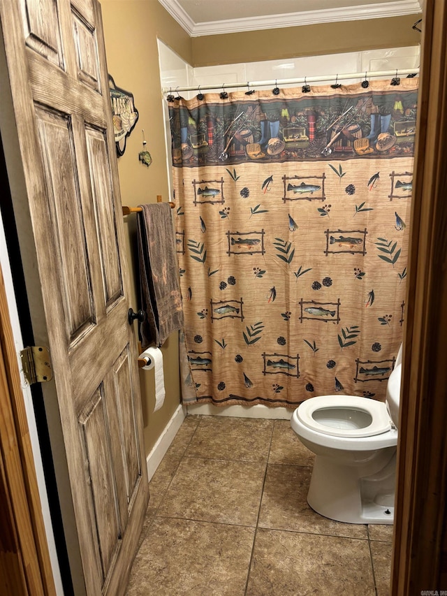 bathroom featuring tile patterned floors, toilet, shower / tub combo, and ornamental molding