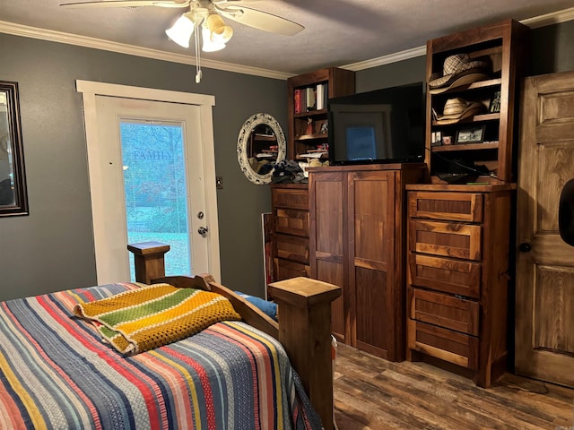 bedroom featuring access to outside, hardwood / wood-style floors, ceiling fan, and crown molding