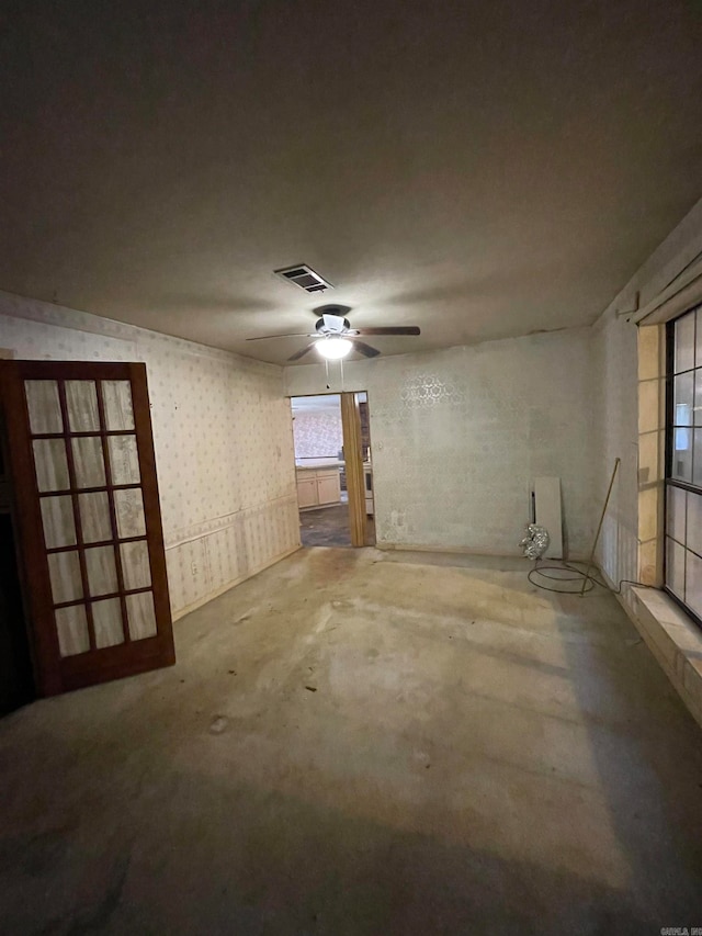 basement with ceiling fan