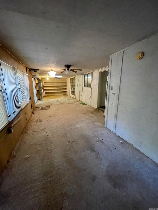 basement with ceiling fan