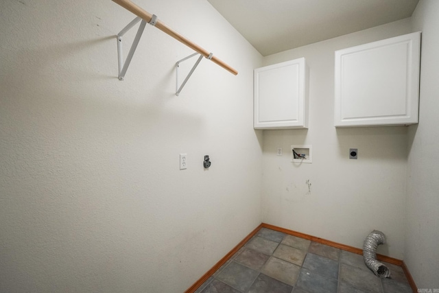 laundry area featuring electric dryer hookup, washer hookup, and cabinets