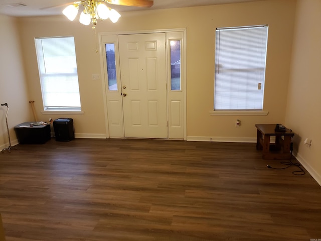 foyer entrance with ceiling fan and dark hardwood / wood-style floors