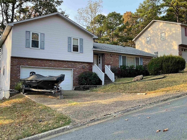 split level home featuring a garage