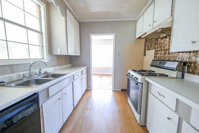 kitchen featuring white cabinets, white range with gas stovetop, sink, and dishwasher