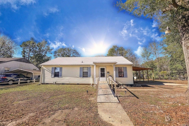 view of front of house featuring a carport