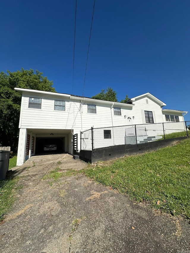 view of side of home featuring a carport