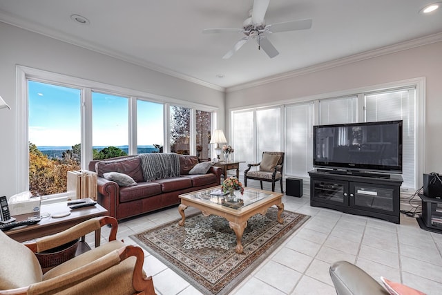 tiled living room with ceiling fan and crown molding