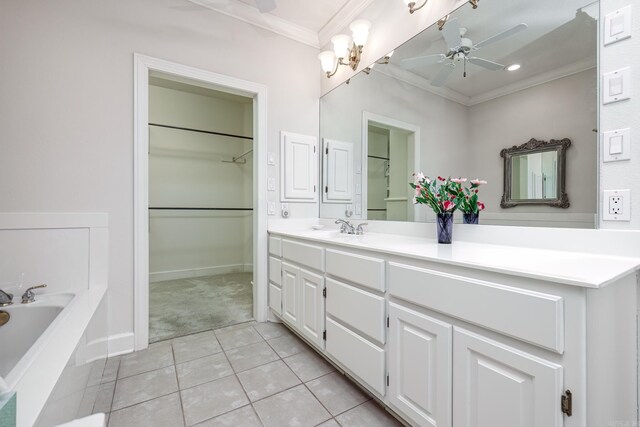 bathroom with tile patterned flooring, ornamental molding, ceiling fan, vanity, and a bath