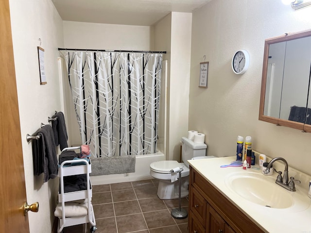 full bathroom with tile patterned floors, vanity, toilet, and shower / tub combo