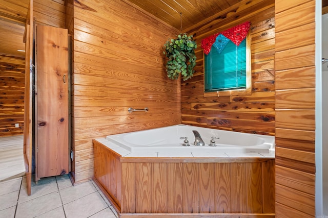 bathroom with wooden ceiling, a tub, wooden walls, and tile patterned floors