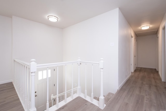 hallway featuring hardwood / wood-style flooring