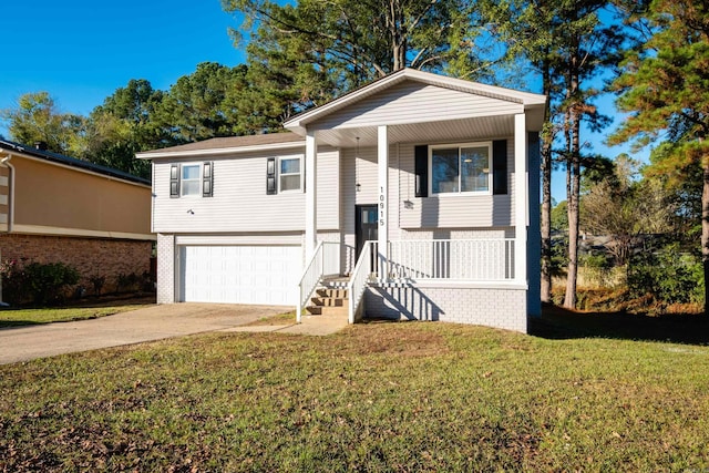 view of front of house featuring a garage and a front yard