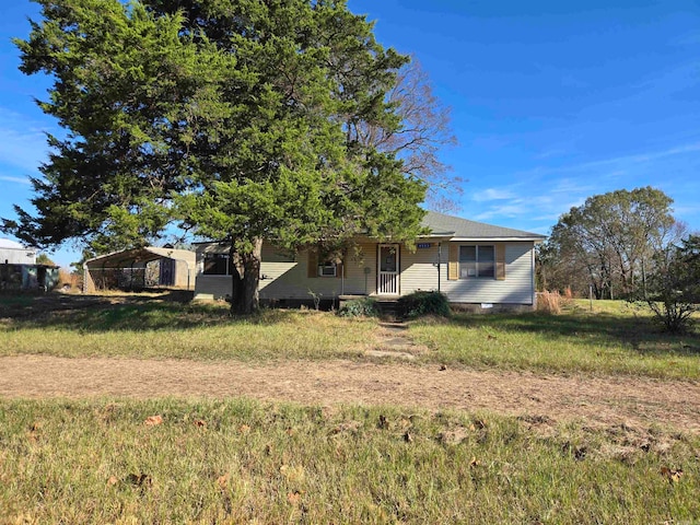 view of front of house with a carport