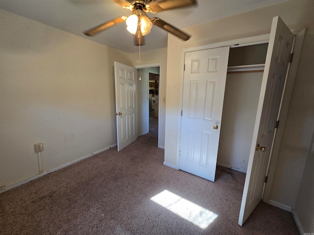 unfurnished bedroom featuring carpet floors, a closet, and ceiling fan