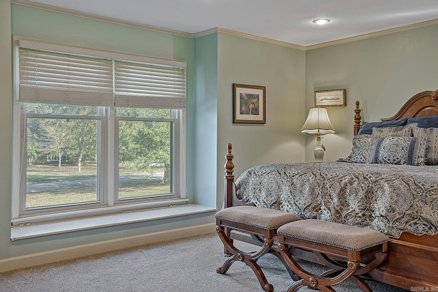 bedroom with carpet flooring and ornamental molding