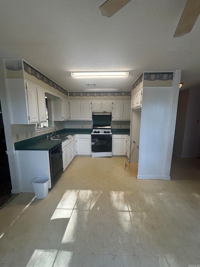 kitchen featuring white range with gas cooktop, a textured ceiling, black dishwasher, and white cabinets