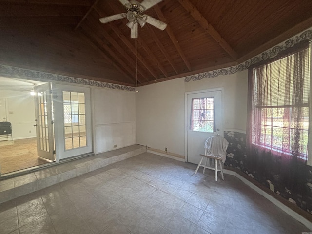 unfurnished room with ceiling fan, wooden ceiling, baseboards, high vaulted ceiling, and beam ceiling
