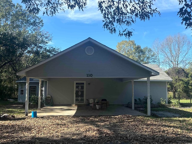 rear view of house with a patio area