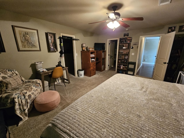 carpeted bedroom with ceiling fan