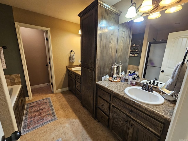 513 Saint Charles Ct, Haskell, AR 72015 - full bathroom with vanity, a bathtub, a chandelier, tile patterned floors, and baseboards