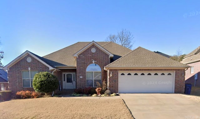 ranch-style home with a garage