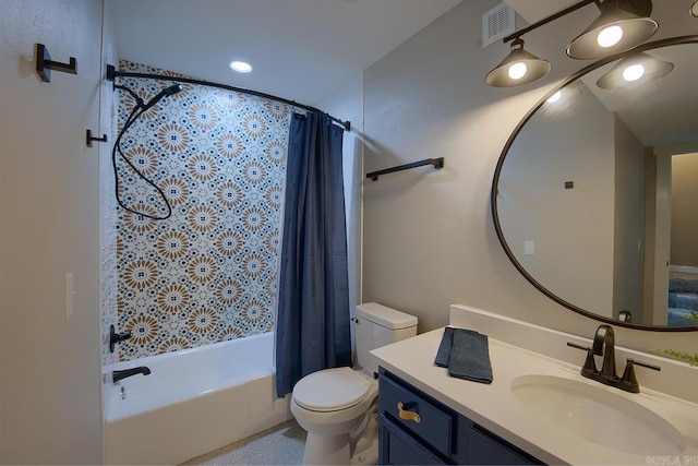 full bathroom featuring toilet, shower / bath combo, and vanity