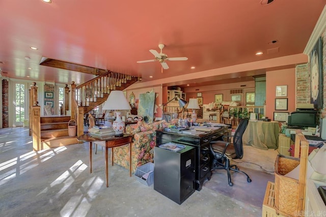 home office featuring concrete flooring and ceiling fan