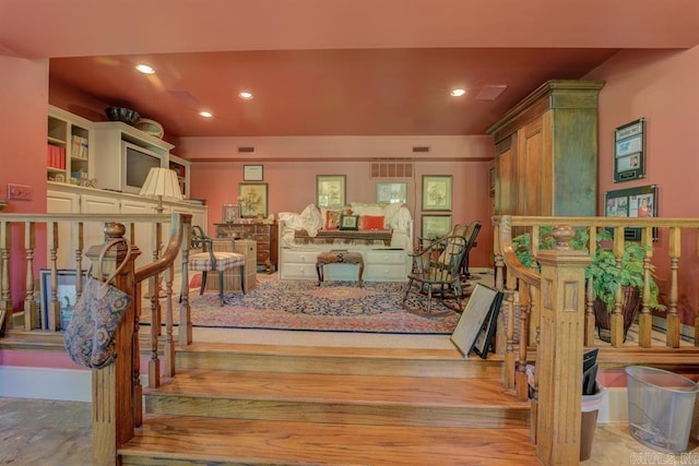 living room with light hardwood / wood-style flooring