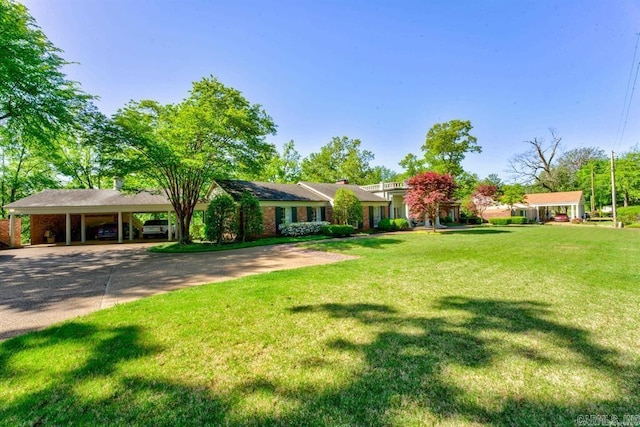 view of yard with a carport