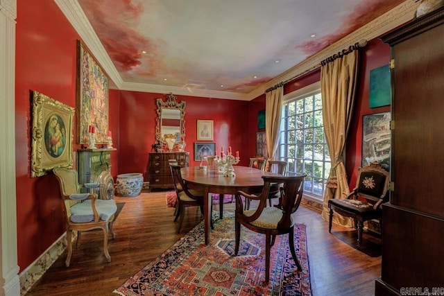 dining room with dark hardwood / wood-style floors and crown molding