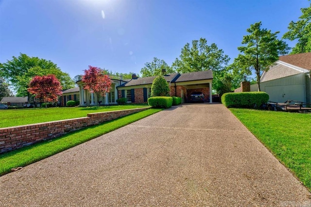 single story home featuring a front yard