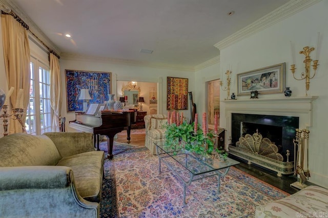 living room featuring hardwood / wood-style flooring and ornamental molding